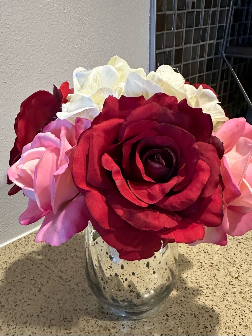 16 Pink, red and cream floral center piece arrangements used for wedding